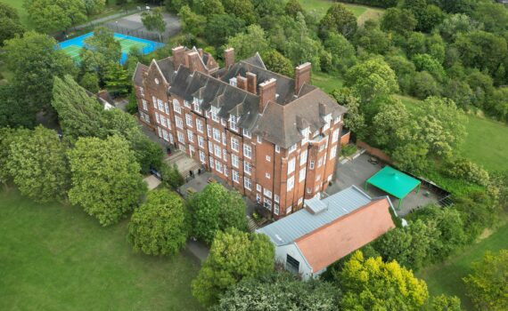 Aerial view of Prendergast School roof areas in London SE4 during drone inspection