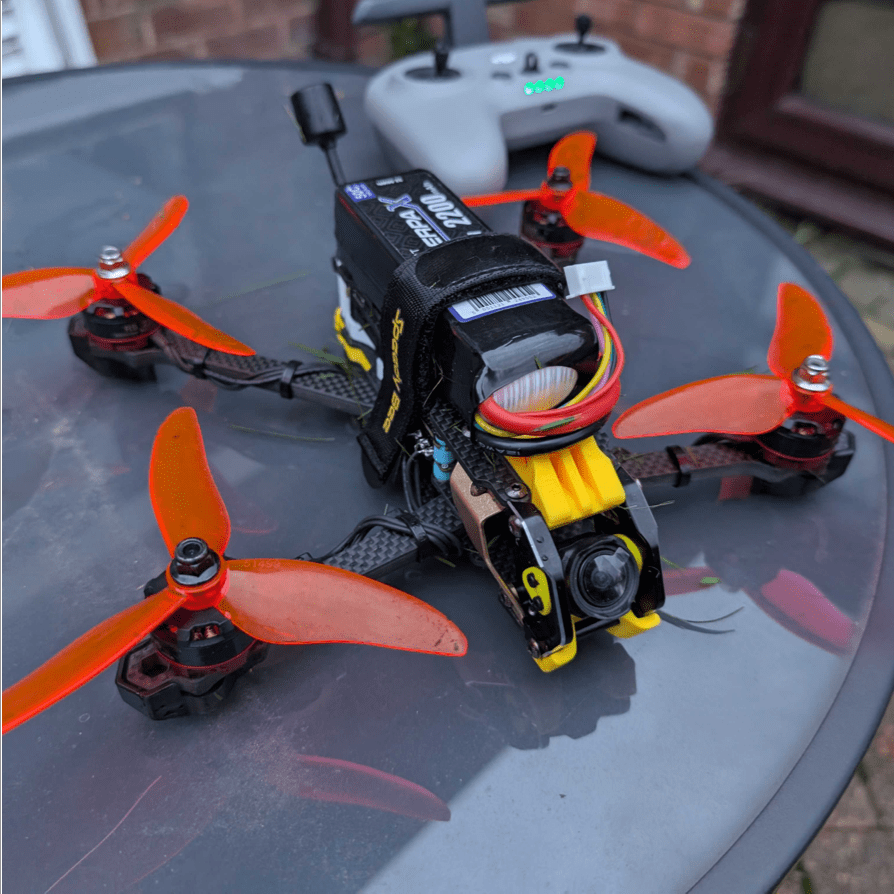 Overview of custom-build FPV drone and flight controller.