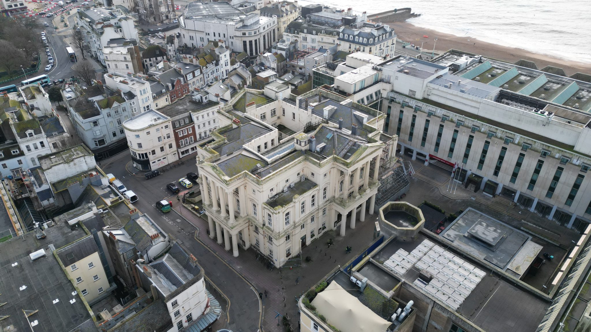 High-level drone image of Brighton Town Hall showing roof structure and adjacent streets in the urban setting of Bartholomew Road, Brighton.