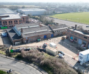 Drone overview of the Browells Lane site prior to demolition, providing the baseline for the phased construction progress record.