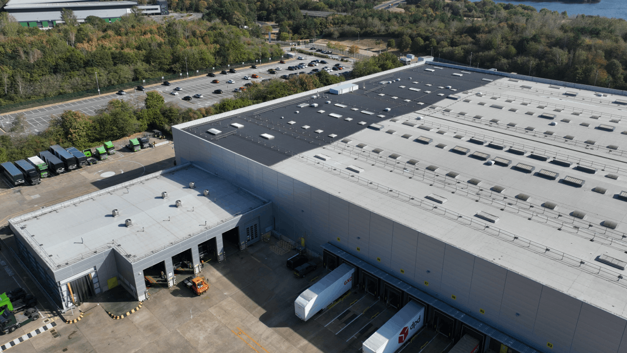 Aerial view of a corner of the 620,000 sq ft distribution centre, showing different roof levels, plant and high-level roof features.